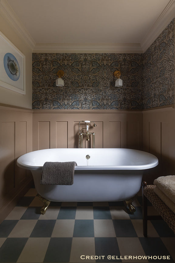 Bathroom with Edwardian Wall Panelling, a freestanding bathtub, checkered floor, and patterned wall.